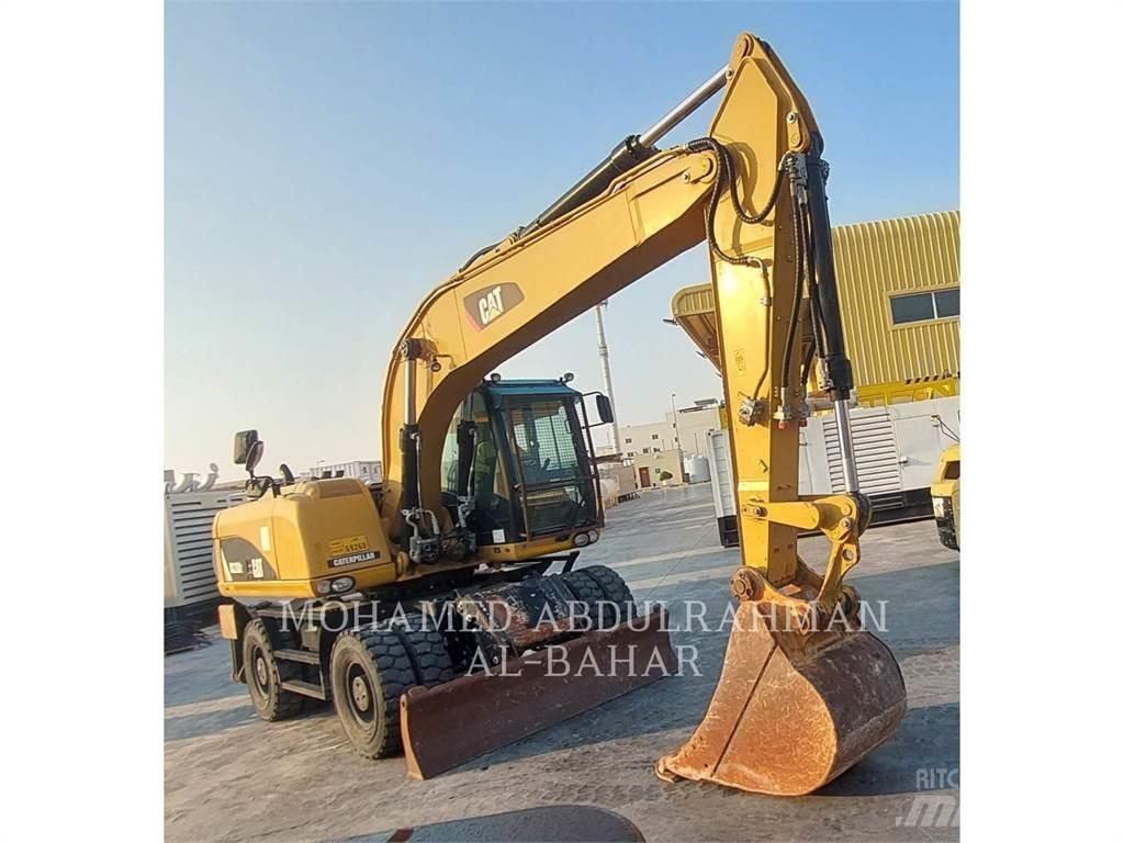 CAT M320D2 Колёсные экскаваторы