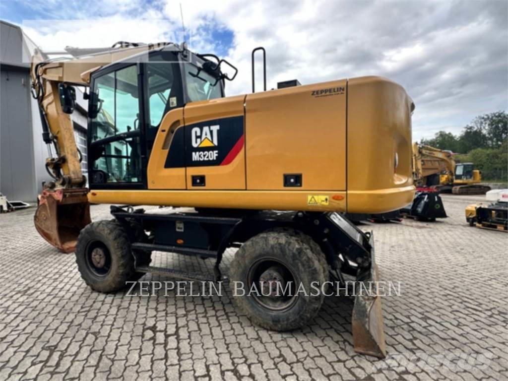CAT M320F Колёсные экскаваторы