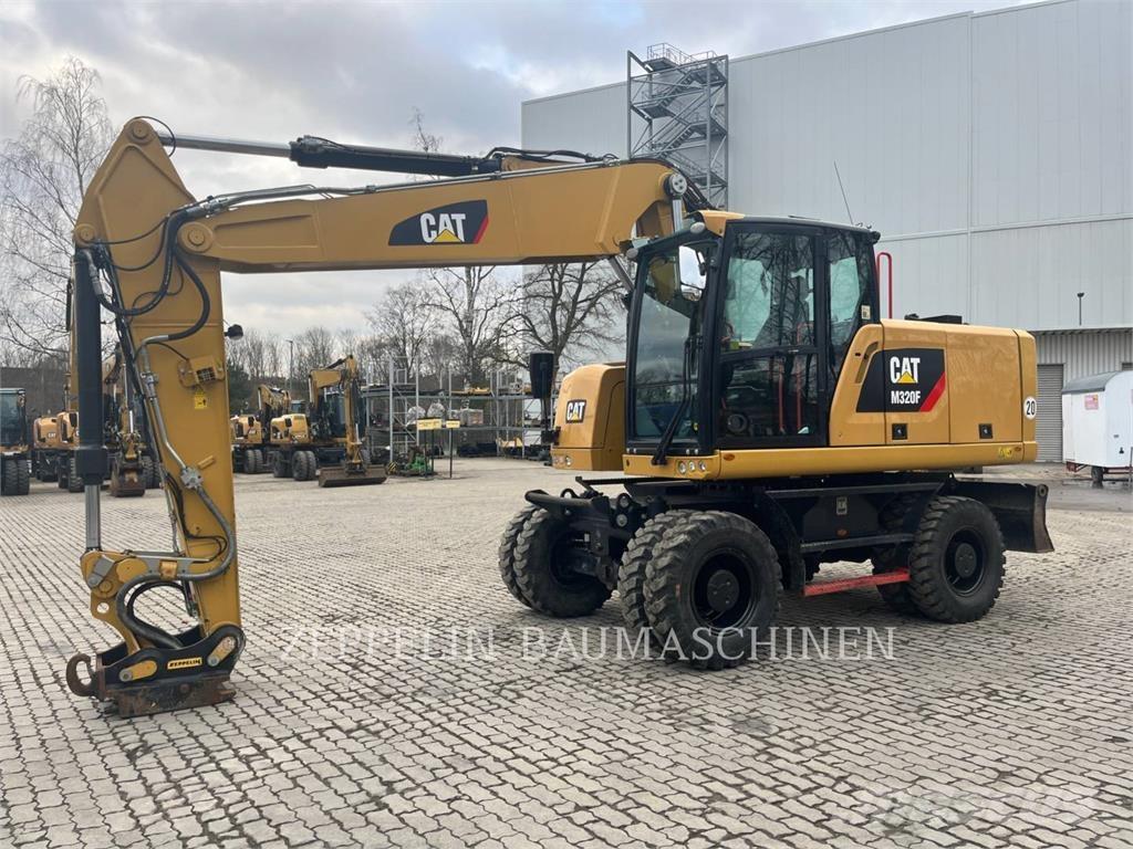 CAT M320F Колёсные экскаваторы