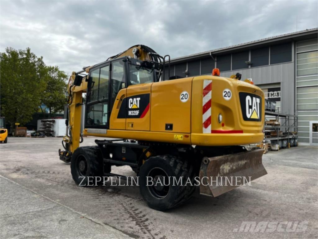CAT M320F Колёсные экскаваторы
