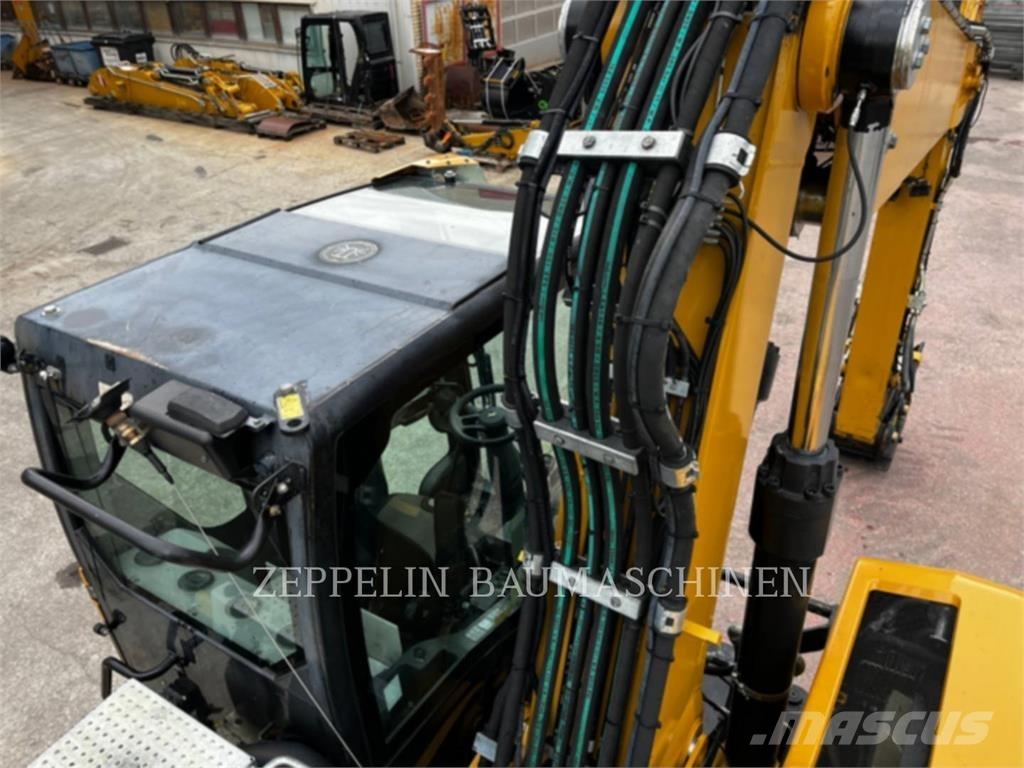 CAT M320F Колёсные экскаваторы