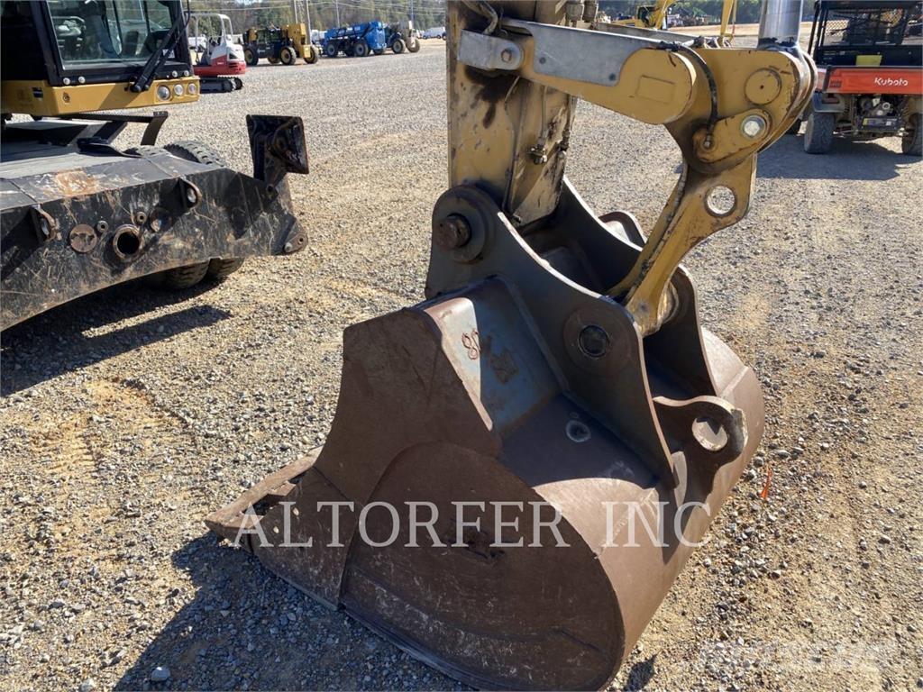 CAT M320F Колёсные экскаваторы