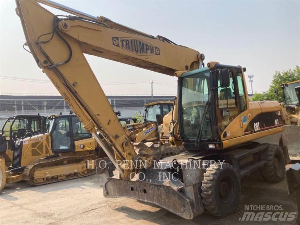 CAT M322C Колёсные экскаваторы