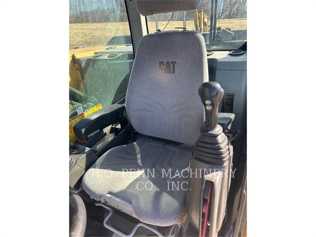 CAT M322F Колёсные экскаваторы