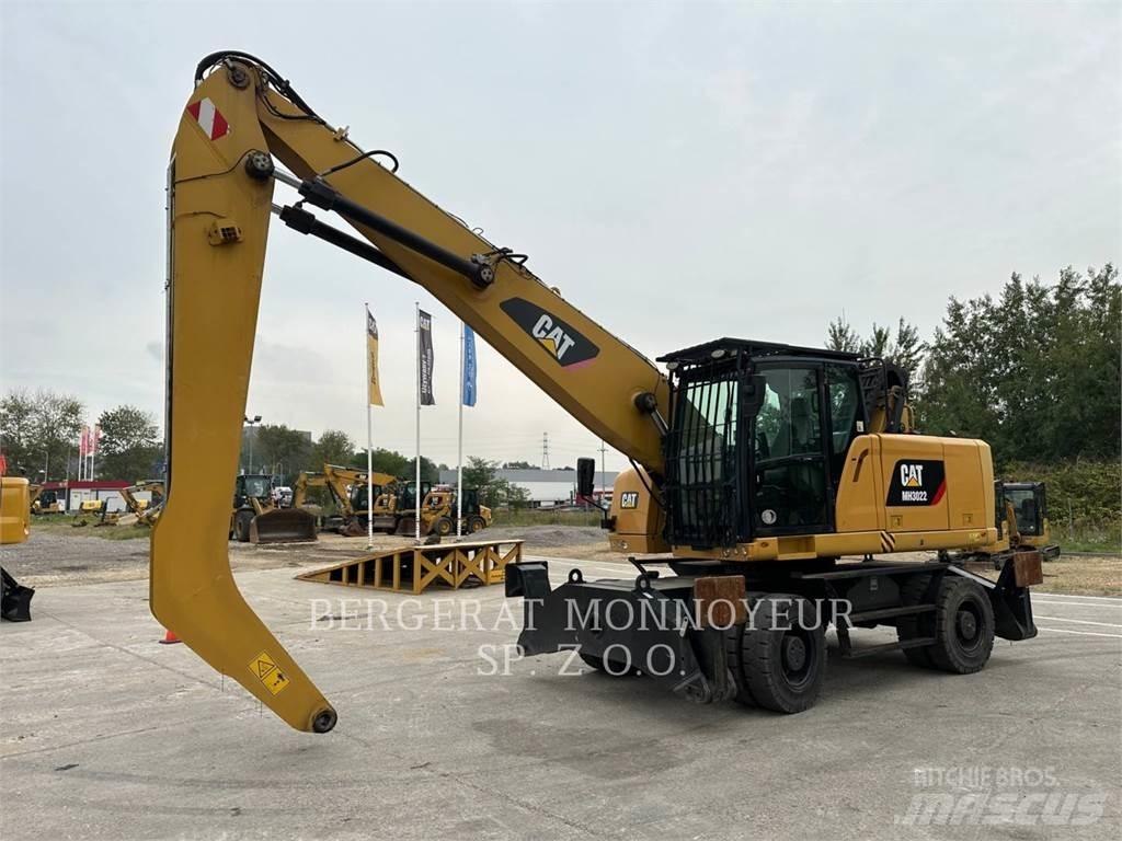 CAT MH3022 Колёсные экскаваторы