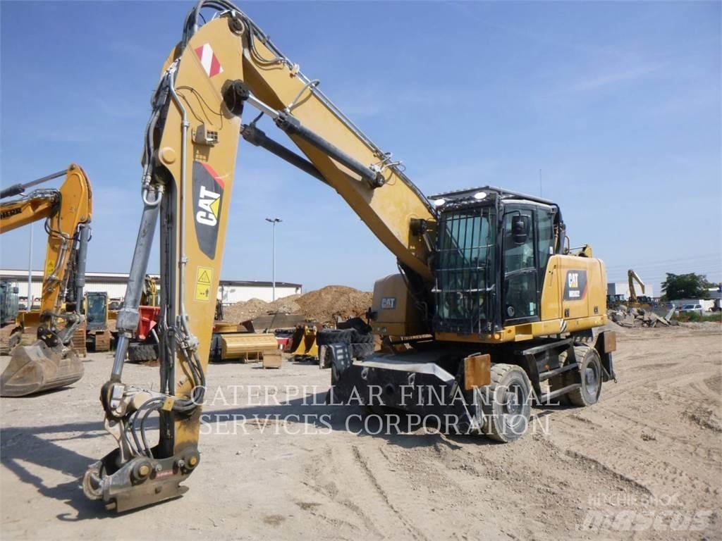 CAT MH3022-06 Колёсные экскаваторы