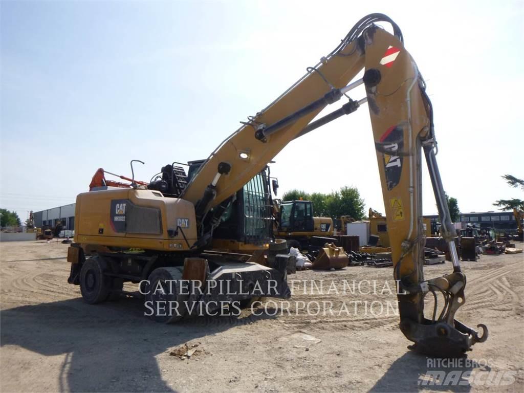 CAT MH3022-06 Колёсные экскаваторы