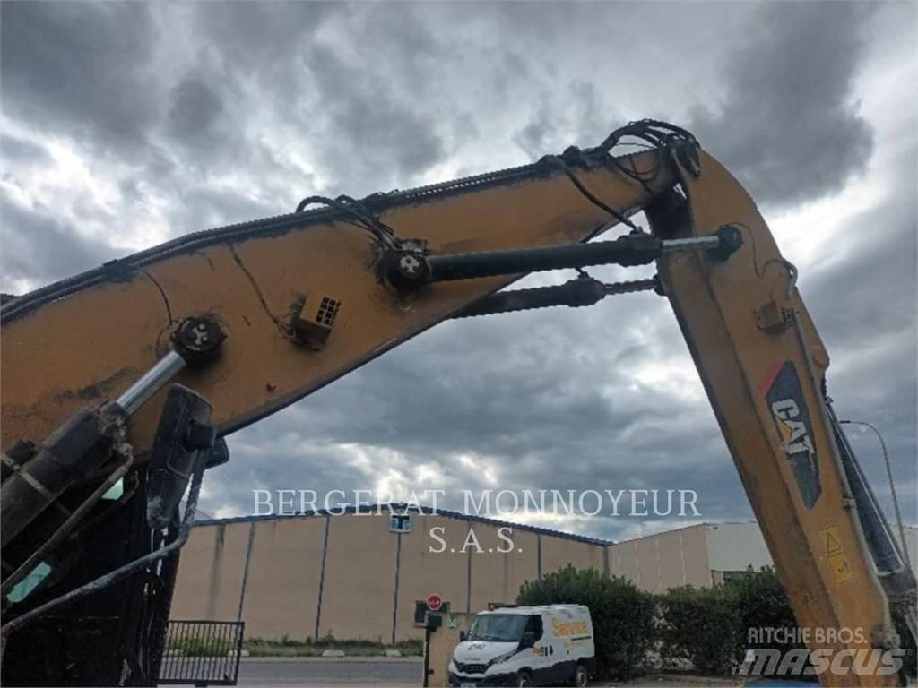 CAT MH3022-1 Колёсные экскаваторы