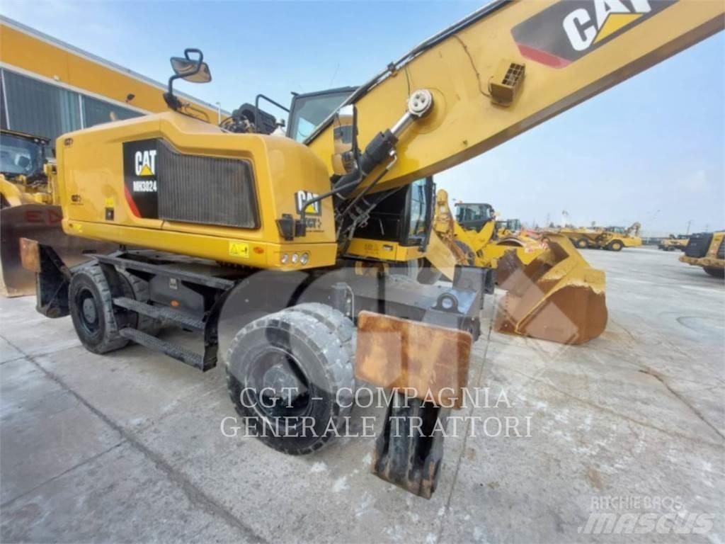 CAT MH3024 Колёсные экскаваторы