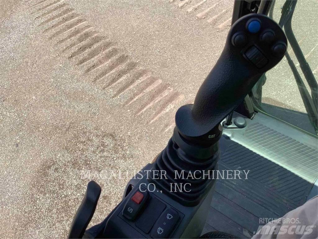 CAT MH3024 Колёсные экскаваторы