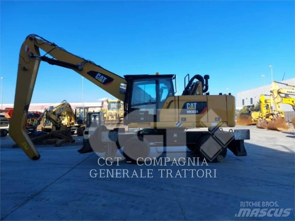 CAT MH3024 Колёсные экскаваторы