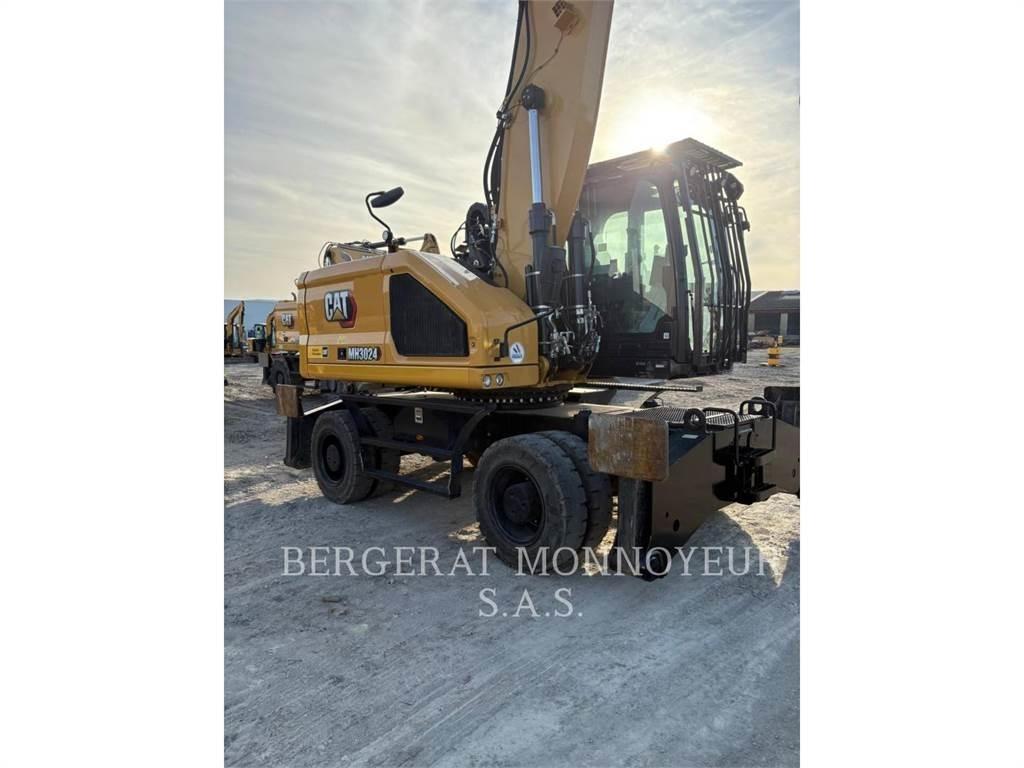CAT MH3024 Колёсные экскаваторы