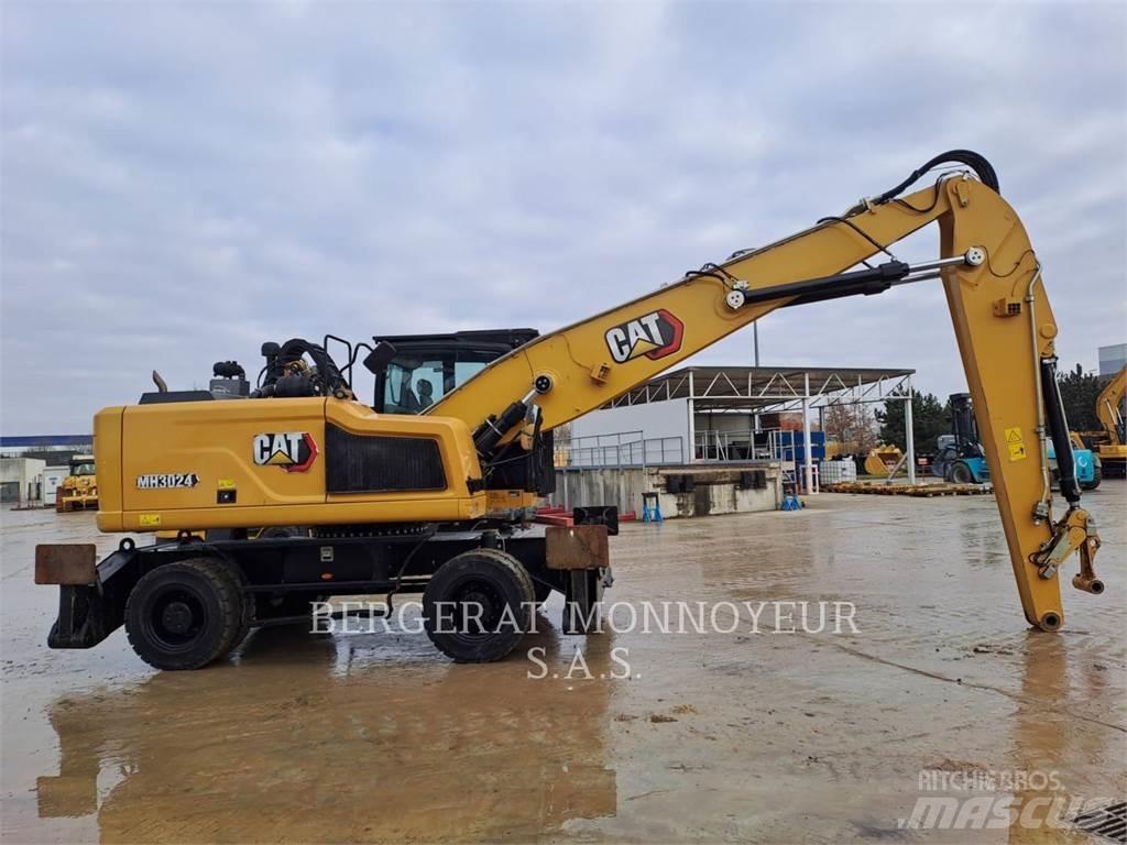 CAT MH3024 Колёсные экскаваторы