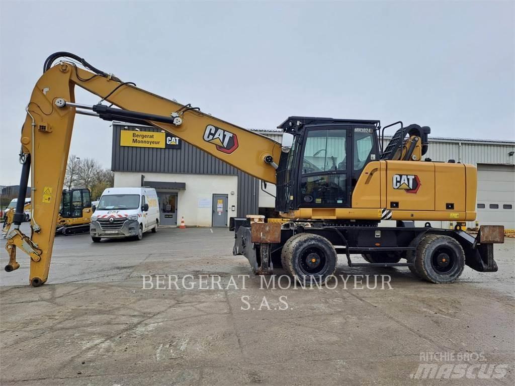 CAT MH3024 Колёсные экскаваторы