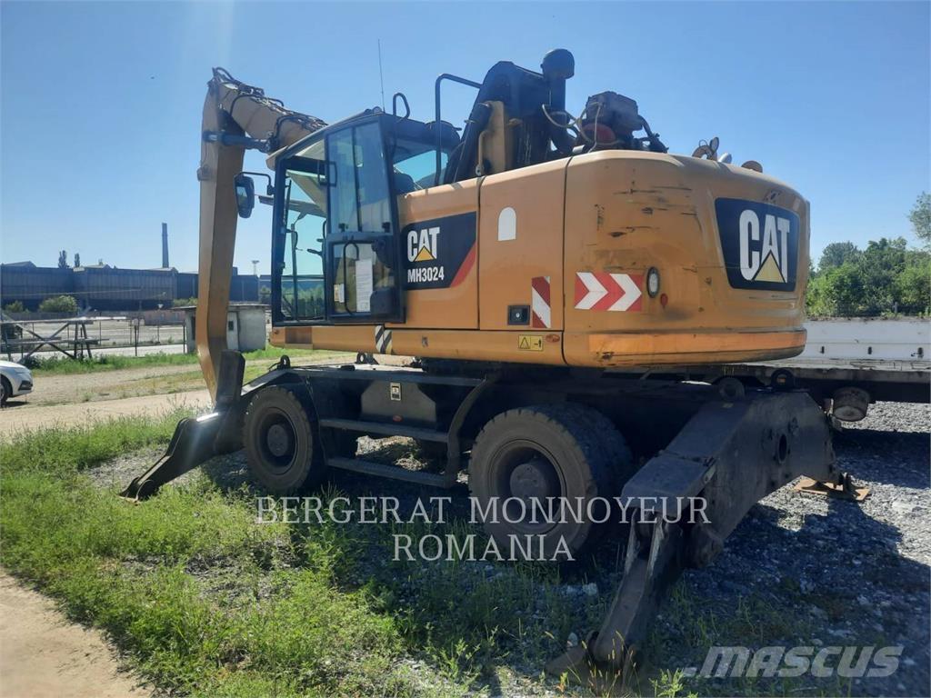 CAT MH3024-06 Колёсные экскаваторы