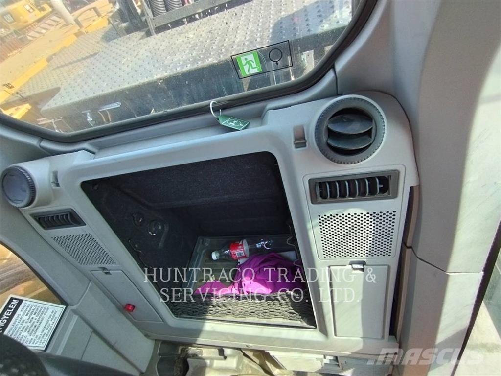 CAT MH3024-07 Колёсные экскаваторы