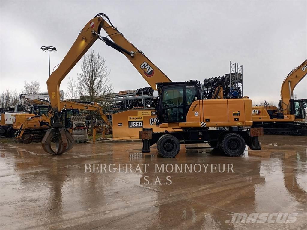 CAT MH3024-1 Колёсные экскаваторы