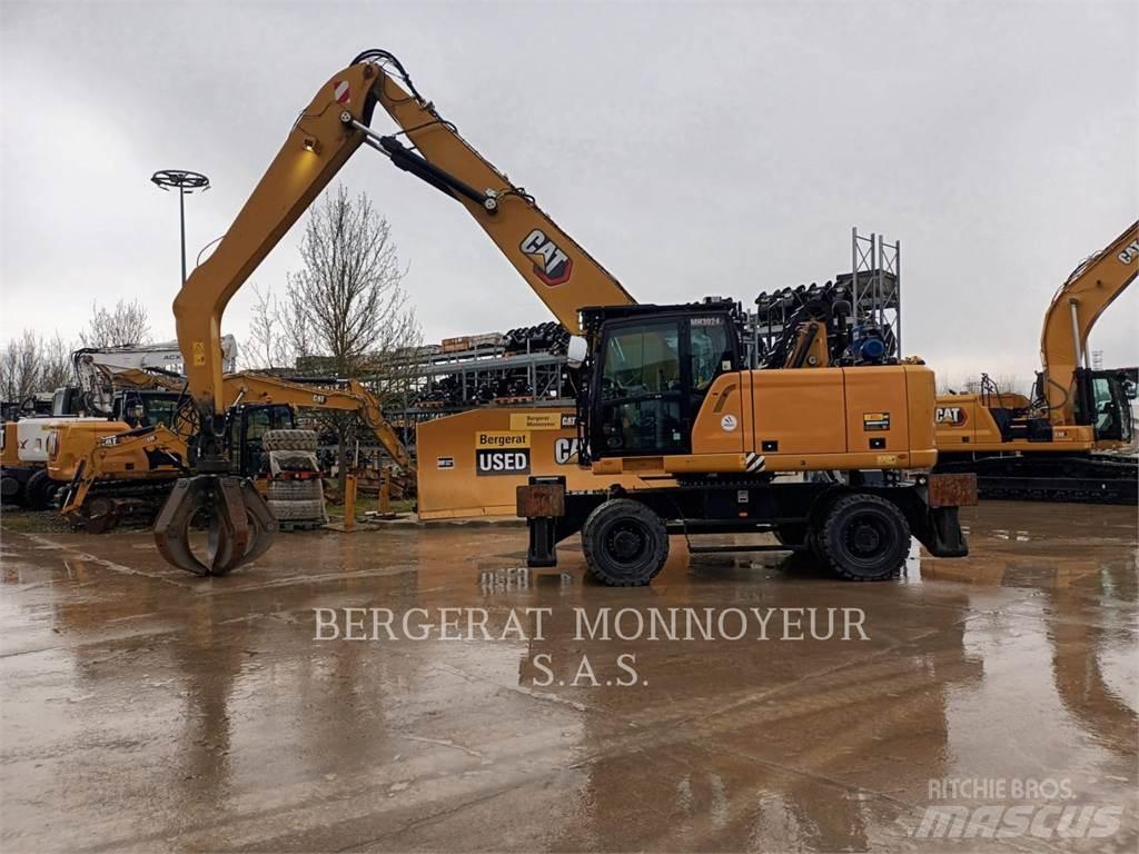 CAT MH3024-1 Колёсные экскаваторы