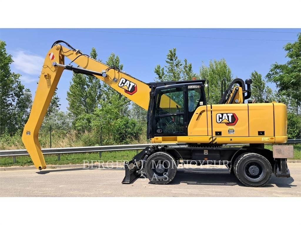 CAT MH3024-1 Колёсные экскаваторы