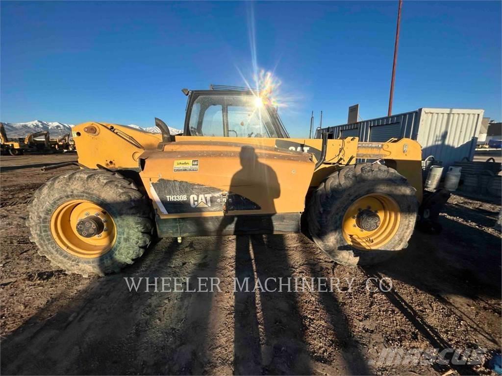 CAT TH330B Телескопические погрузчики