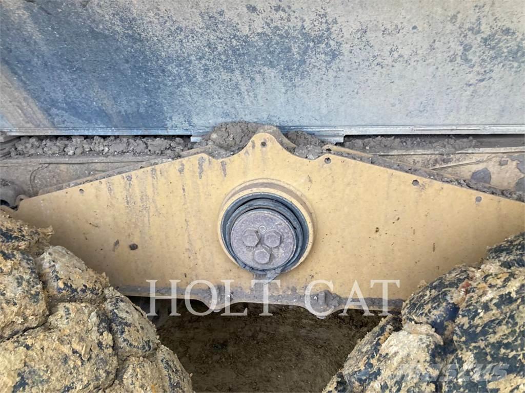 CAT W00 730 Шарнирно-сочленённые самосвалы