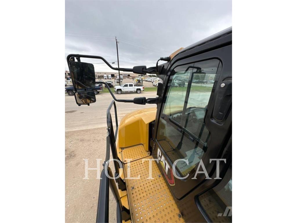 CAT W00 730 Шарнирно-сочленённые самосвалы