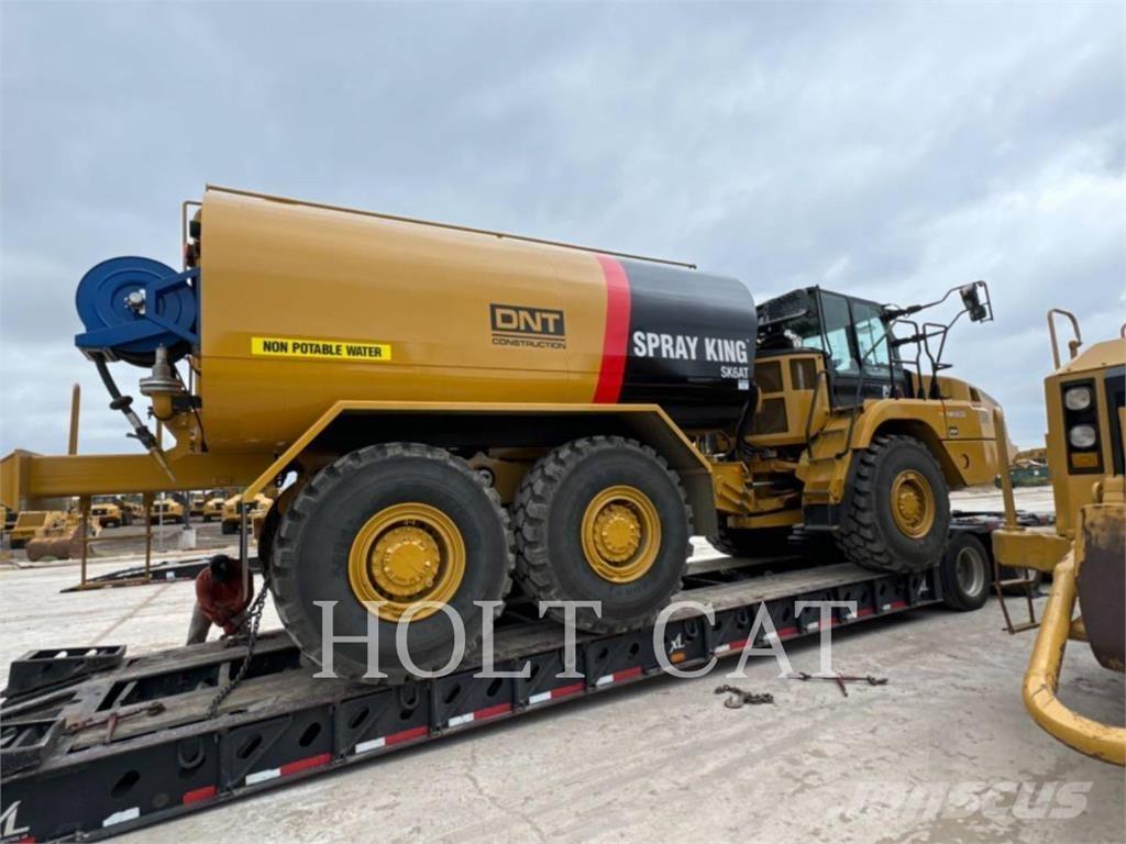 CAT W00 730 Шарнирно-сочленённые самосвалы