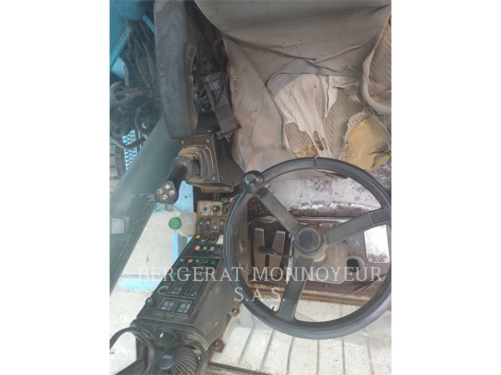 Fuchs MHL320 Колёсные экскаваторы