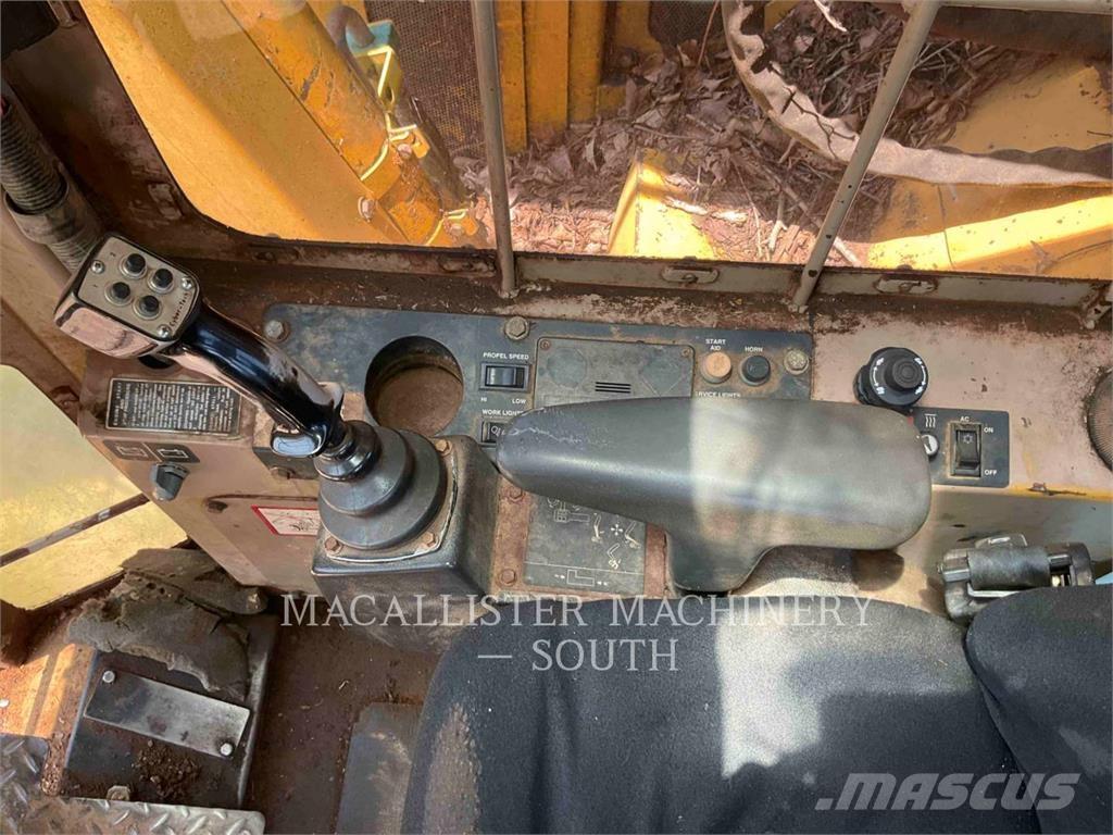 John Deere 653E Валочно-пакетирующие машины