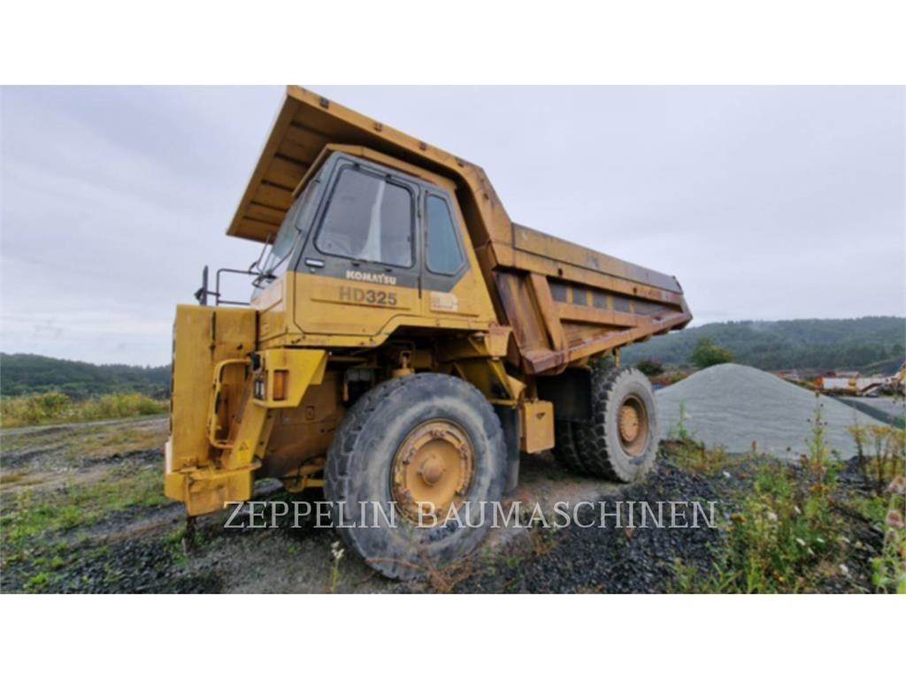 Komatsu HD325-6 Шарнирно-сочленённые самосвалы
