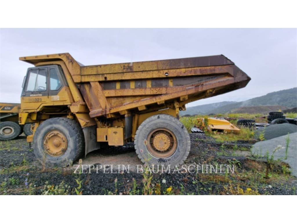 Komatsu HD325-6 Шарнирно-сочленённые самосвалы