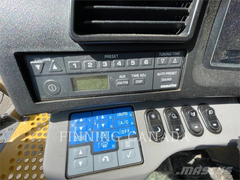 Komatsu HD605-8 Шарнирно-сочленённые самосвалы