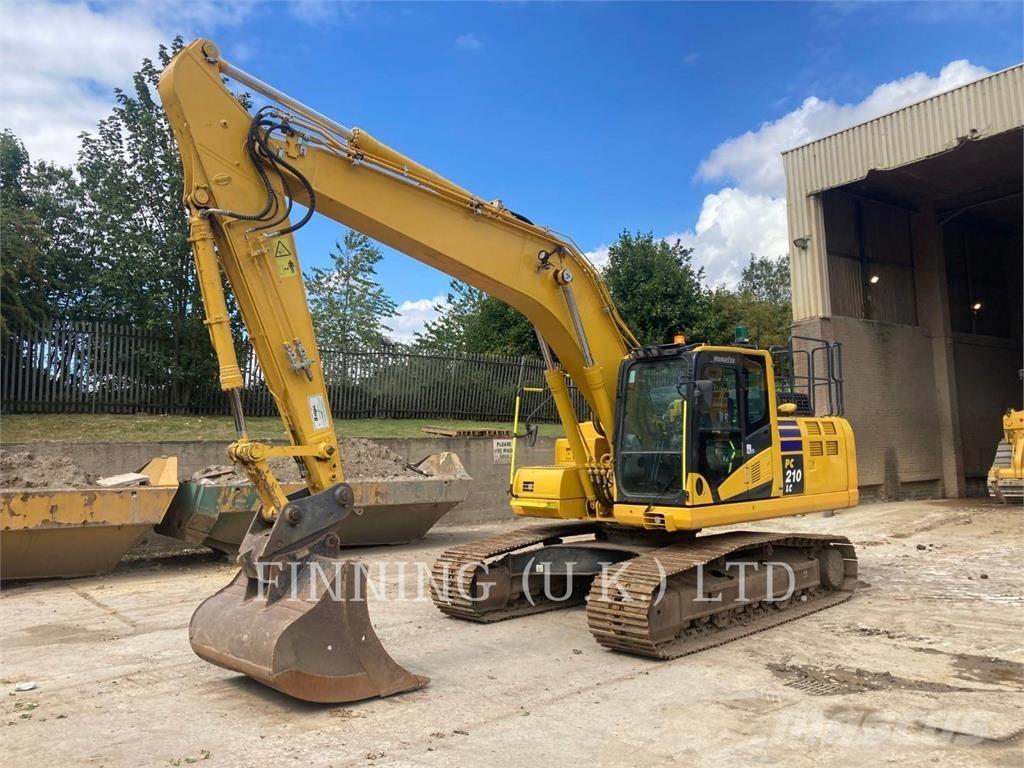 Komatsu PC210-11E0 Гусеничные экскаваторы