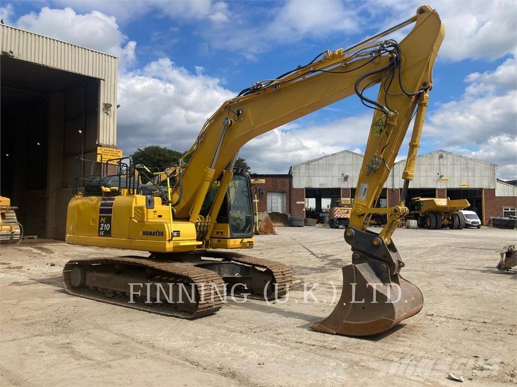 Komatsu PC210-11E0 Гусеничные экскаваторы