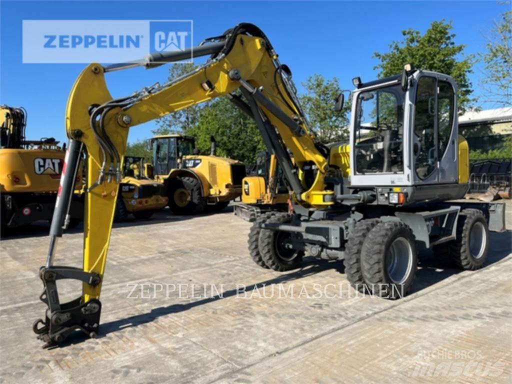 Neuson EW100 Колёсные экскаваторы