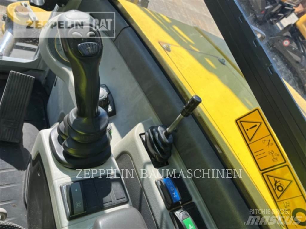 Neuson EW100 Колёсные экскаваторы