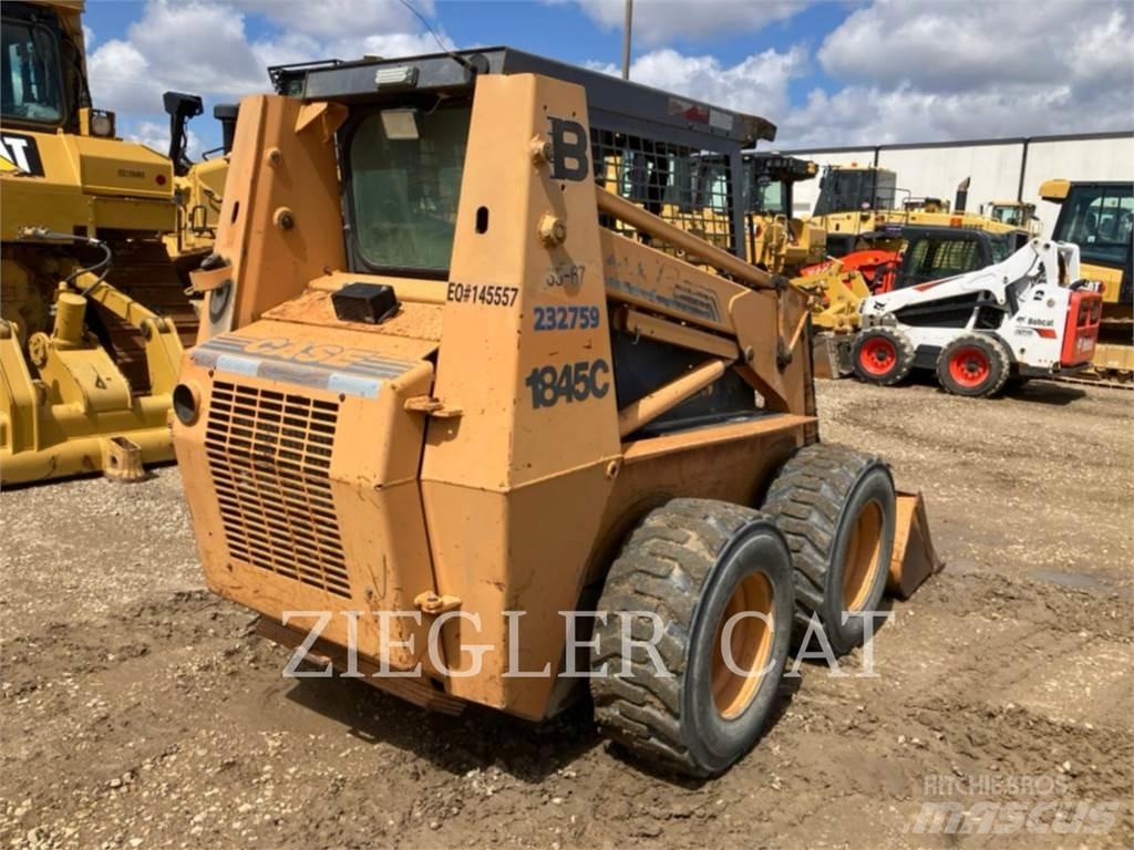 New Holland 1845 Мини-погрузчики