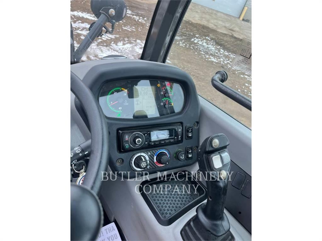 New Holland 321F Фронтальные погрузчики