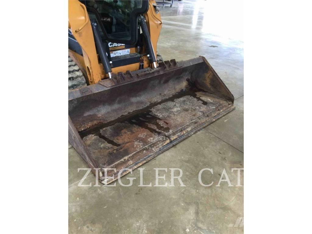New Holland TR270B Гусеничные фронтальные погрузчики