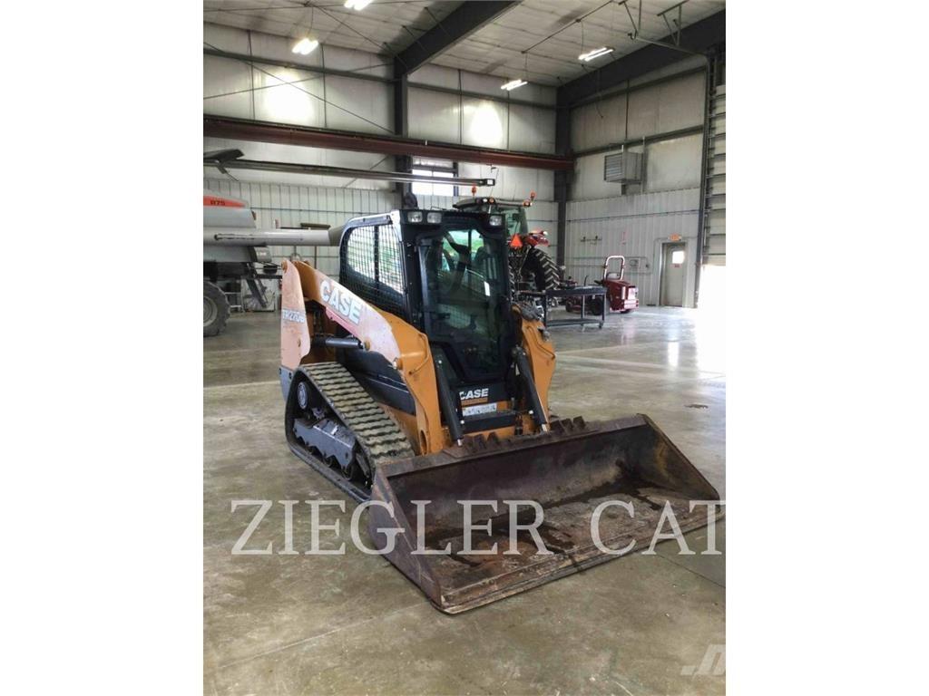 New Holland TR270B Гусеничные фронтальные погрузчики