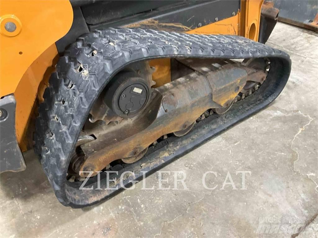 New Holland TR310B Гусеничные фронтальные погрузчики