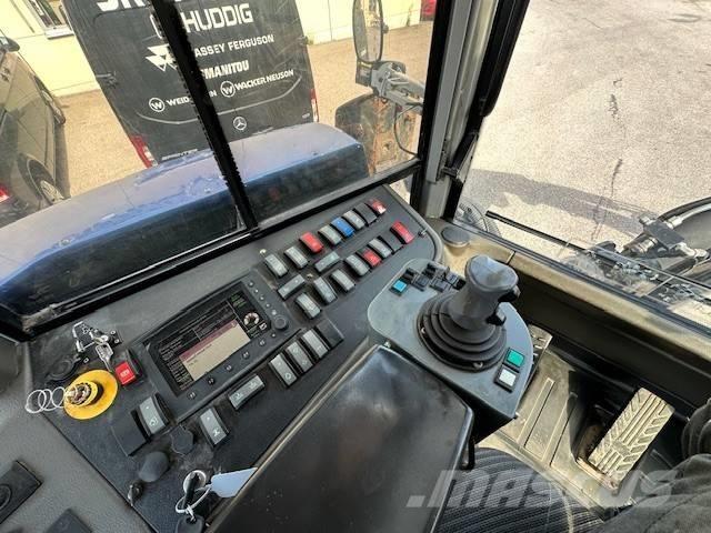 Huddig 1260B City Экскаваторы-погрузчики