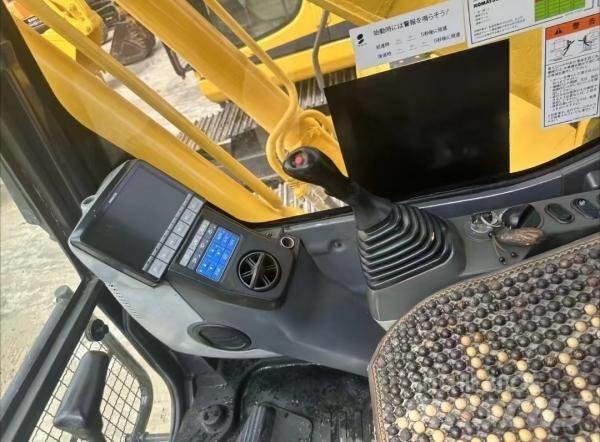 Komatsu PC 200 Малые экскаваторы 7т-12т