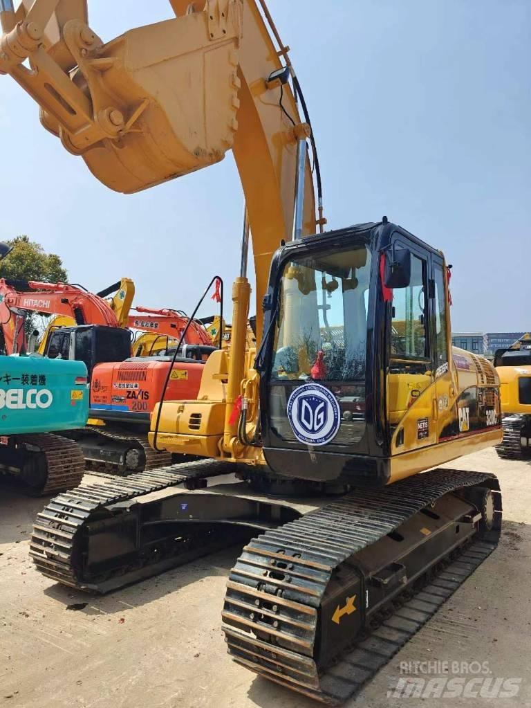 CAT CAT320C Малые экскаваторы 7т-12т
