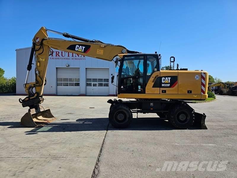 CAT M 320F Колёсные экскаваторы