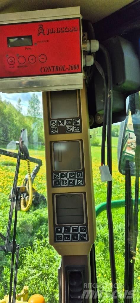 John Deere 7300 Самоходные кормоуборочные комбайны