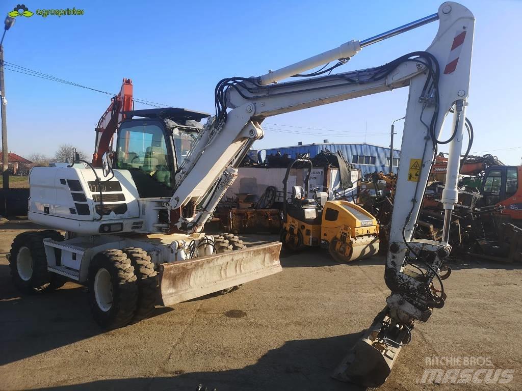 CASE WX 125 Колёсные экскаваторы