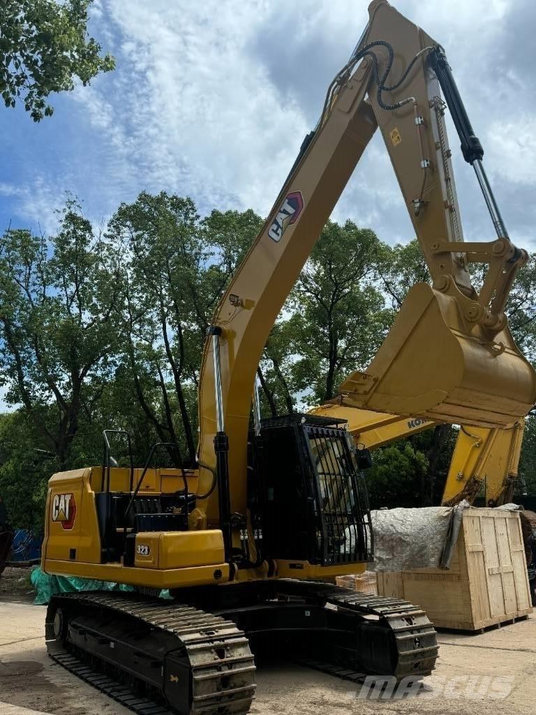 CAT 323 Малые экскаваторы 7т-12т