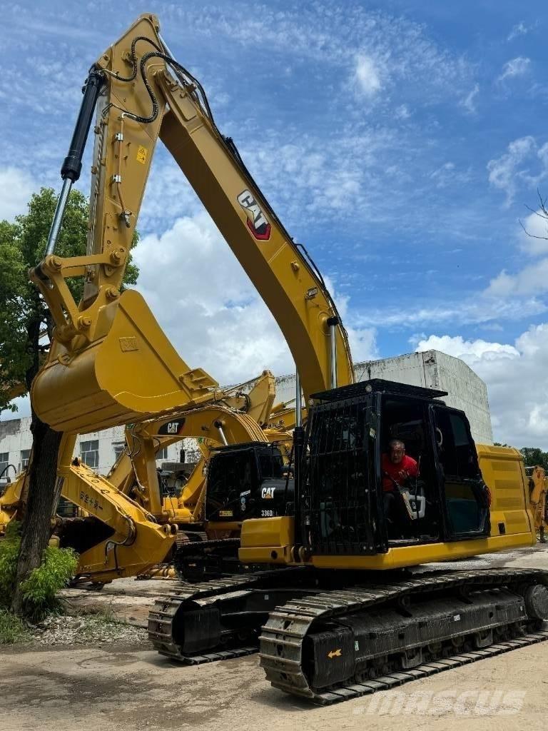 CAT 323 Малые экскаваторы 7т-12т