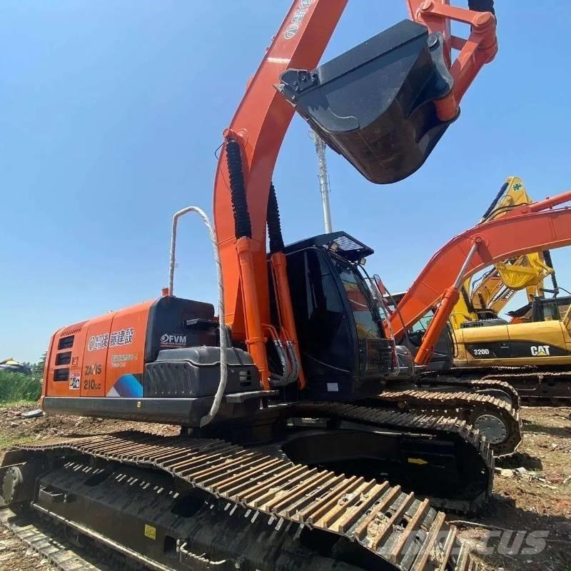 Hitachi ZX 210 Гусеничные экскаваторы